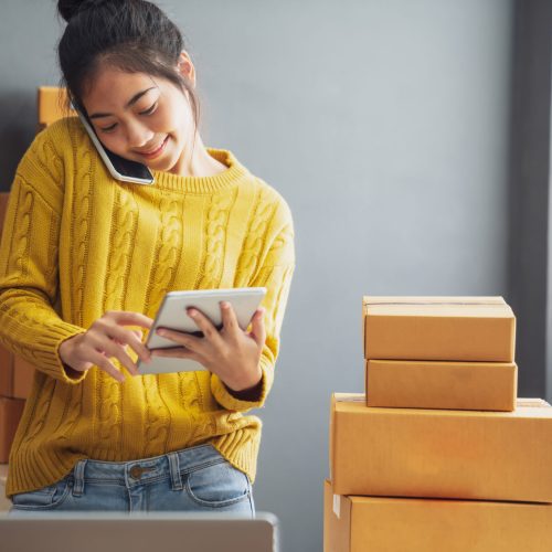 Startup,Small,Business,Sme,,Entrepreneur,Owner,Using,Smartphone,Or,Tablet